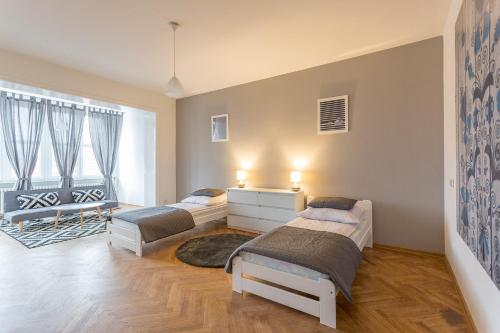 Ένα ή περισσότερα κρεβάτια σε δωμάτιο στο Hostel Zakątek ulica Grunwaldzka