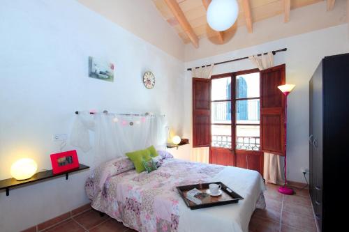 Кровать или кровати в номере Casa Es Forn 229 by Mallorca Charme