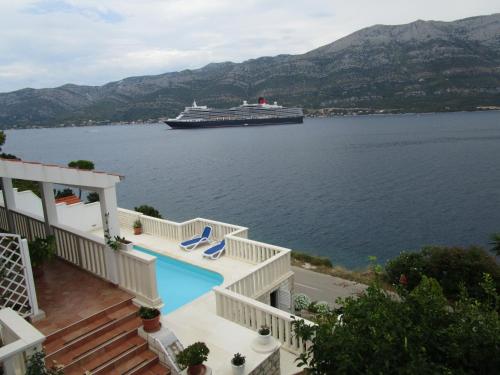 a cruise ship in a large body of water at Vila Tea in Korčula