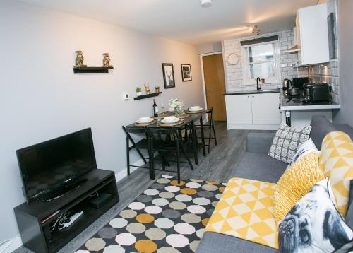 Kuchyň nebo kuchyňský kout v ubytování Malone Place Apartment