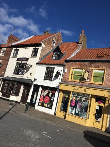 a white building on the side of a street at OurHaus in Beverley
