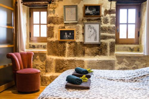 En eller flere senge i et værelse på Toits et Moi