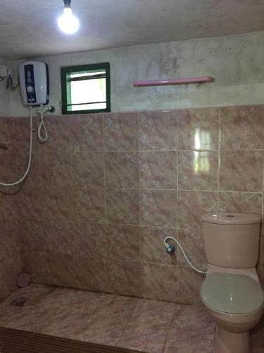 Koupelna v ubytování Bandula Home Stay