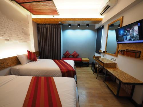 Ps Sriphu Hotelにあるベッド