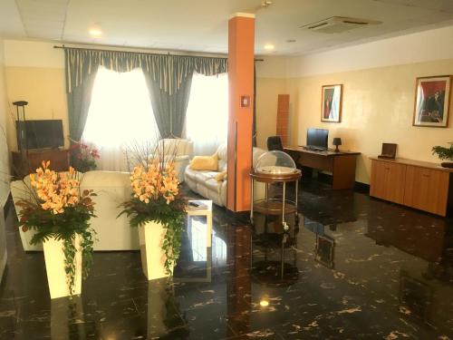 TV a/nebo společenská místnost v ubytování Hotel Internazionale Gorizia