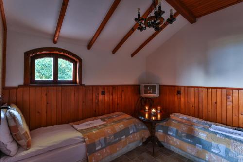 A bed or beds in a room at Guest House Villa Teres