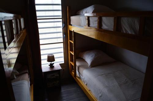 Postel nebo postele na pokoji v ubytování Le Gîte du Koniambo