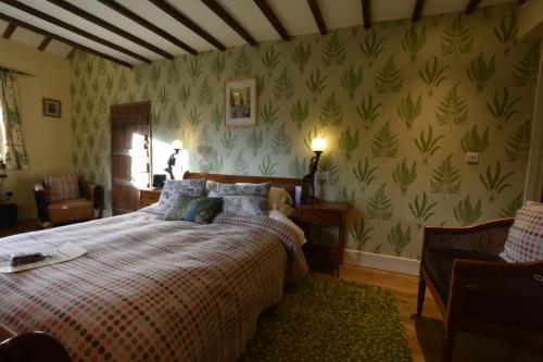 Ένα ή περισσότερα κρεβάτια σε δωμάτιο στο Low Mill Guesthouse