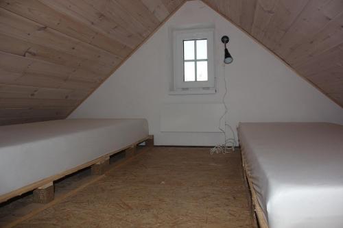 Postel nebo postele na pokoji v ubytování Chata Fajfrtka
