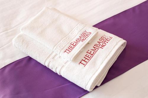 a white towel with the words happy new year written on it at The Embassy Nord in Bucharest