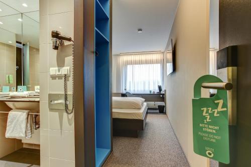 A bathroom at Centro Parkhotel Stuttgart