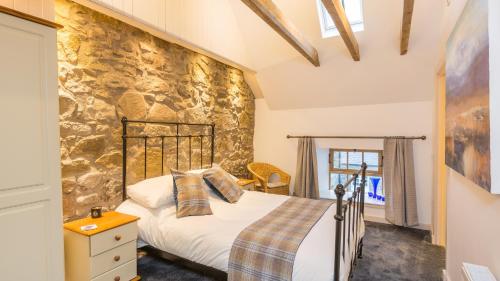 Tempat tidur dalam kamar di Hayloft Edinburgh