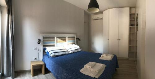 Postel nebo postele na pokoji v ubytování A Casa di Leo