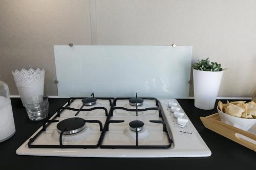 Campeggio Ai Colli Fioritiにあるキッチンまたは簡易キッチン