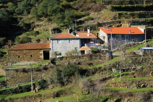 a house on the side of a hill at Casa da Passagem in Vila Real