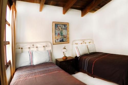 Säng eller sängar i ett rum på Villas Santa Ana