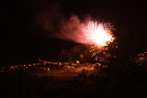 a firework display in the sky at night at Albergo Pian del Bosco in Novafeltria
