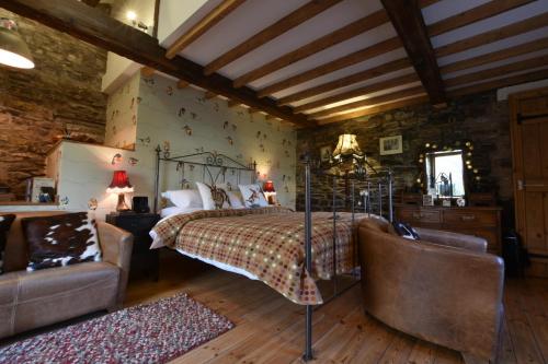 Ένα ή περισσότερα κρεβάτια σε δωμάτιο στο Low Mill Guesthouse