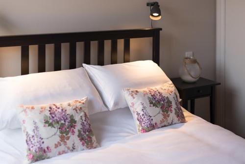 Ένα ή περισσότερα κρεβάτια σε δωμάτιο στο Barclay House
