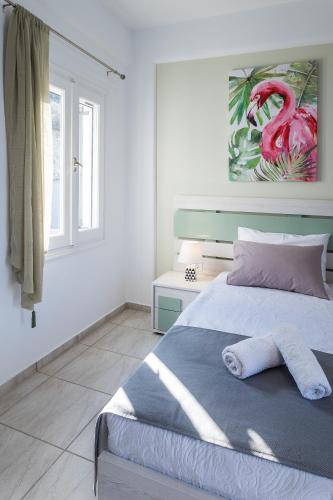 Ένα ή περισσότερα κρεβάτια σε δωμάτιο στο Paros Villas Nereids