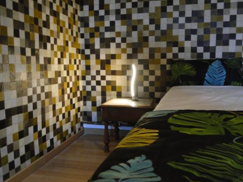 Ein Bett oder Betten in einem Zimmer der Unterkunft Alsace Randonnee ou Ski Bel appartement