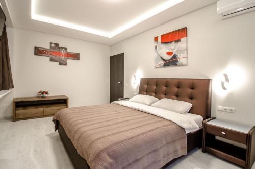 Säng eller sängar i ett rum på Amazing apartment in the center of Kiev