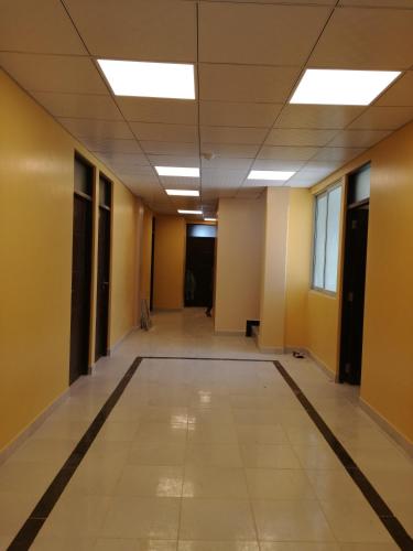 an empty hallway in an office building at The Oruro Inn in Oruro