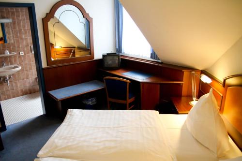 Hotel Garni Italiaにあるベッド