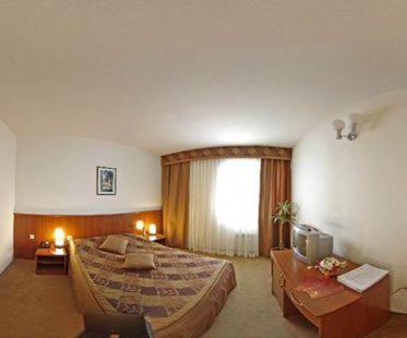 Llit o llits en una habitació de Hotel Kutina