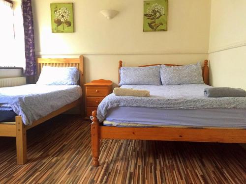 Katil atau katil-katil dalam bilik di The Oasis Hotel