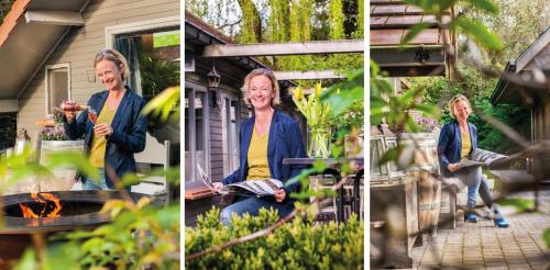 une femme assise sur un banc dans un jardin dans l'établissement B&B Het Brembos, à Wingene