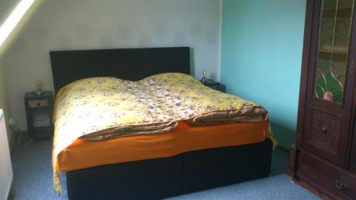En eller flere senge i et værelse på Villa Lotti