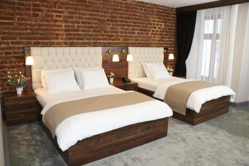 Postel nebo postele na pokoji v ubytování Vita Suites Karaköy