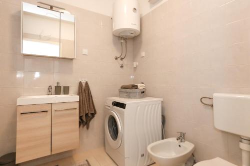 Koupelna v ubytování Apartment Miki