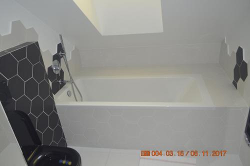 a bathroom with a shower and a toilet at Aloza in Ustka