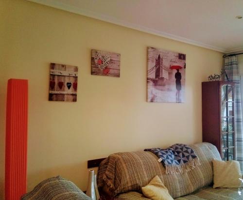 a room with three pictures on the wall at Al-Andalus Thalassa Home Star in Vera