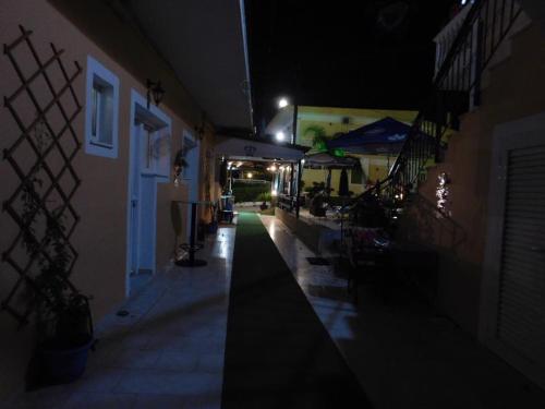 an empty hallway of a building at night at Two Brothers Studios Tsilivi Zakynthos in Tsilivi