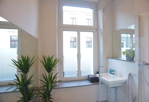Kylpyhuone majoituspaikassa City-Apartment Reger Privatparkplatz