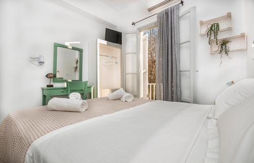 MerSea apartments tesisinde bir odada yatak veya yataklar