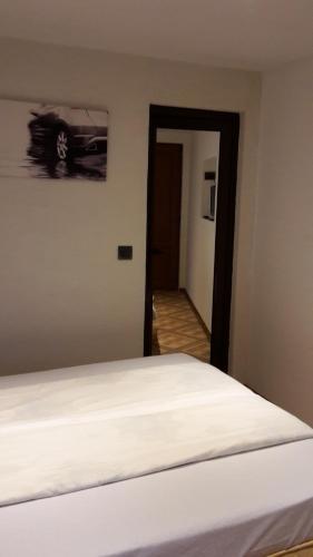 Katil atau katil-katil dalam bilik di Banya Guest Rooms 23