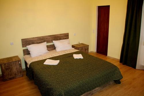 Cama o camas de una habitación en EL-MI