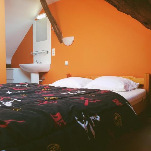 Postel nebo postele na pokoji v ubytování Chez Amand