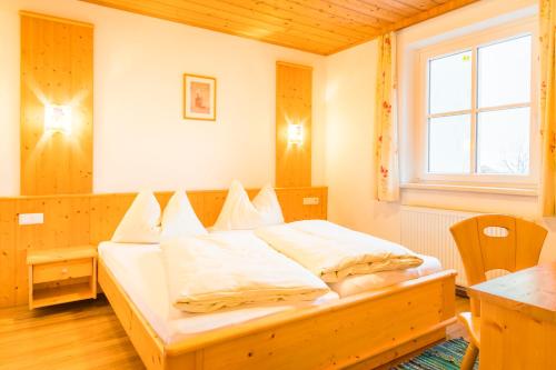 מיטה או מיטות בחדר ב-Hansalagut