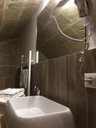 Ένα μπάνιο στο Recinto antico Sweet Rooms