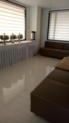 Et opholdsområde på Hotel Sangat Regency