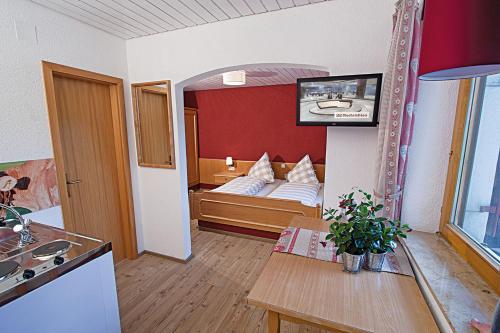 Postel nebo postele na pokoji v ubytování Altensberger Hof