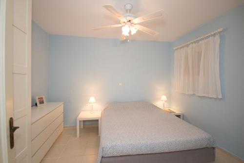 Ένα ή περισσότερα κρεβάτια σε δωμάτιο στο Paros Parikia house