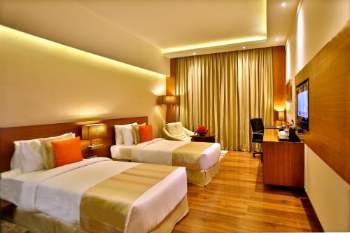 Ένα ή περισσότερα κρεβάτια σε δωμάτιο στο Park Ascent