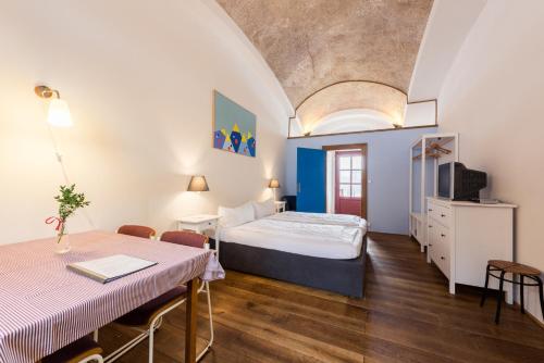 Posteľ alebo postele v izbe v ubytovaní HolidayPark Mlázovy