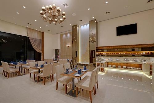 A restaurant or other place to eat at K K Beacon India